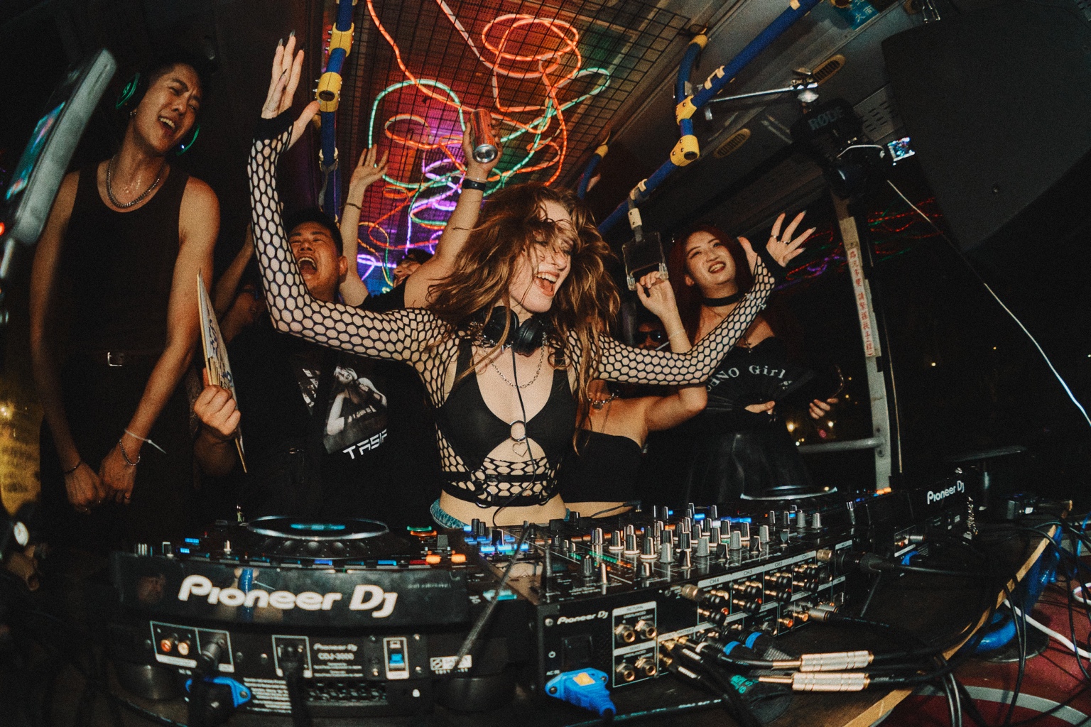 DJ Tasia performing at a club event